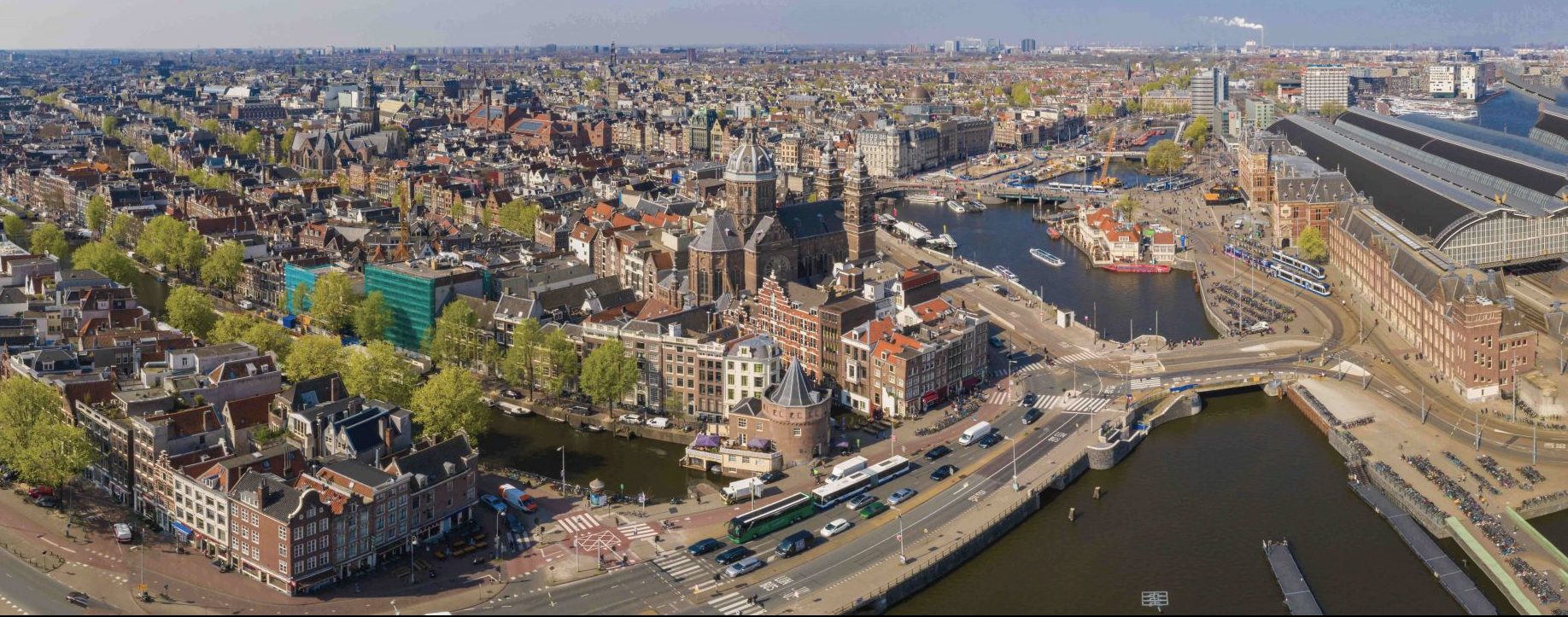 Panoramic aerial view of Amsterdam in a beautiful summer day, Th